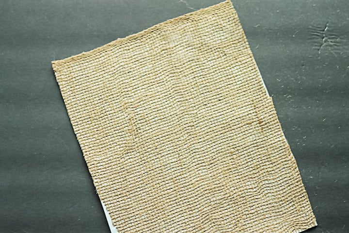 adding freezer paper to burlap