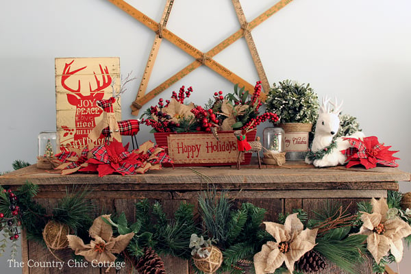 Loving these rustic Christmas mantel decorating ideas! Mason jars, burlap, and barnwood.....my favorite combination!