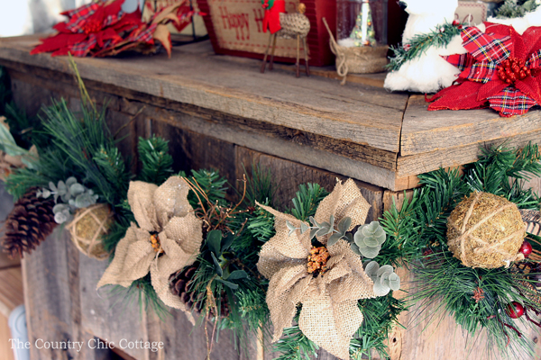 Loving these rustic Christmas mantel decorating ideas! Mason jars, burlap, and barnwood.....my favorite combination!