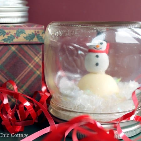 Make an EOS lip balm snow globe as a gift this holiday season! Everyone will love these Christmas gifts!