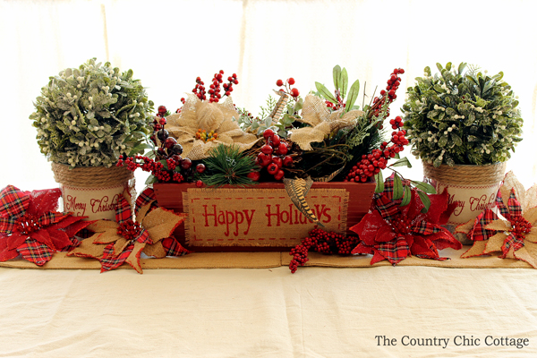 table centerpiece for Christmas with  poinsettias