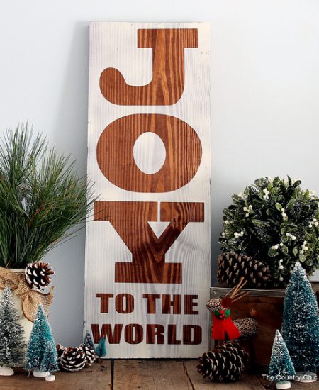 Make this rustic wood sign for Christmas! A super easy project that uses any board that you have on hand!