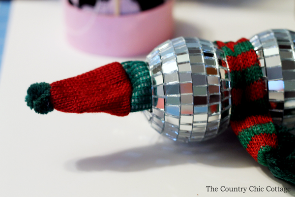 gluing on the hat and scarf