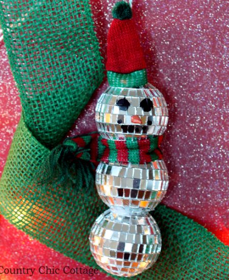 Make this mirror ball snowman ornament in just minutes! A fun craft idea for your Christmas tree!