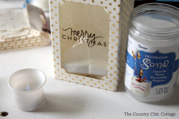 cellophane bag with sand and battery operated tea light