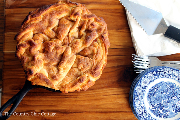 Make this skillet caramel apple pie recipe today! Uses crescent rolls as pie crust for an unexpected twist! So simple to make!