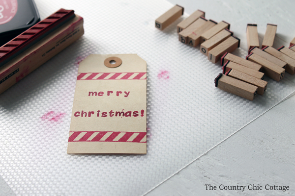 gift tags with stamped "merry christmas" text