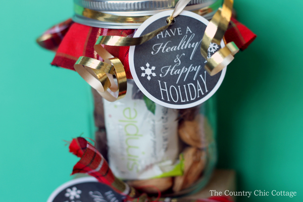 Make this healthy holiday gift in a jar in just minutes! Includes free printable healthy gift tags for any gift! A fun way to help friends and family stay on track during the holidays and the new year!