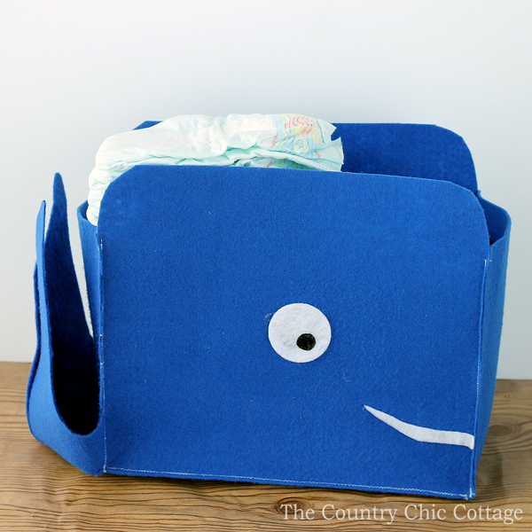 felt storage baskets shaped like a whale