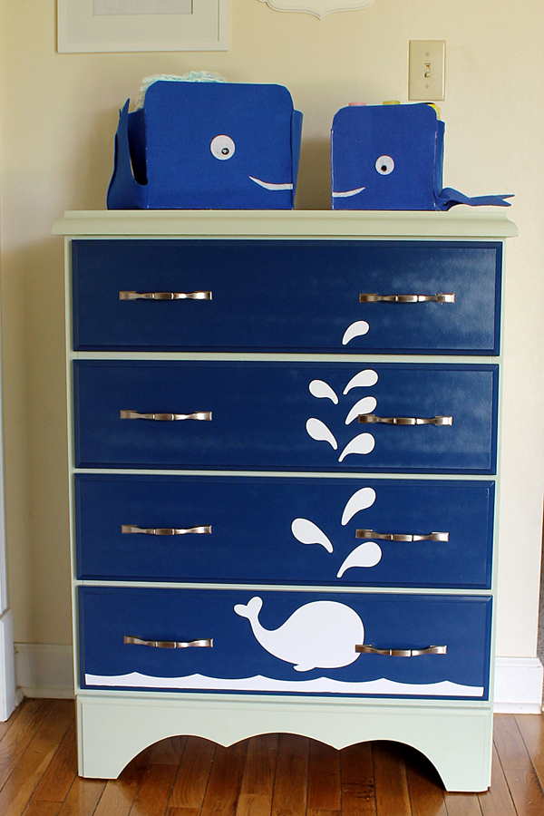 whale shaped storage baskets on dresser