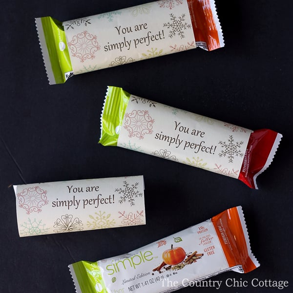 Print these bar gift wrappers for free and wrap a bar for a holiday gift idea! These are perfect for teachers, coaches, mail men, neighbors and so much more! Tell the they are simply perfect!