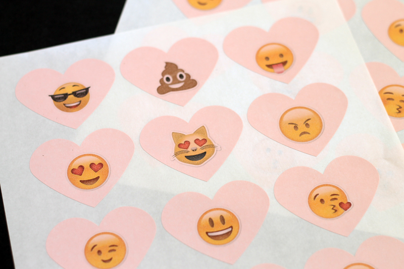 heart shaped stickers with emoji faces printed on them