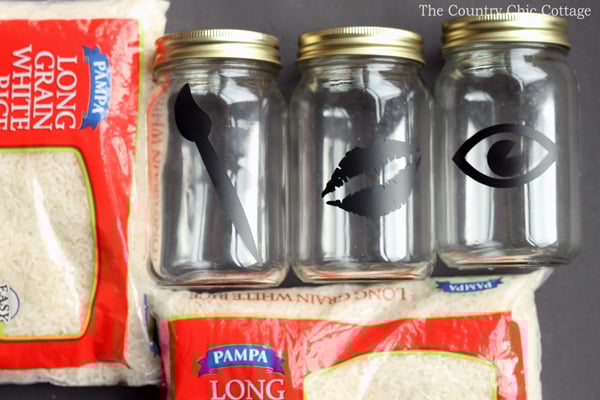3 DIY make up organizer with labels next to two bags of white rice