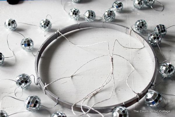 Make your own disco ball chandelier for any room in your home with this great craft tutorial!