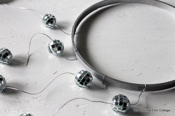 Make your own disco ball chandelier for any room in your home with this great craft tutorial!