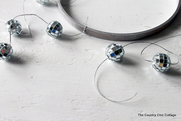 Make your own disco ball chandelier for any room in your home with this great craft tutorial!