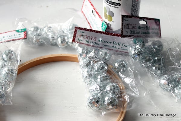 Make your own disco ball chandelier for any room in your home with this great craft tutorial!
