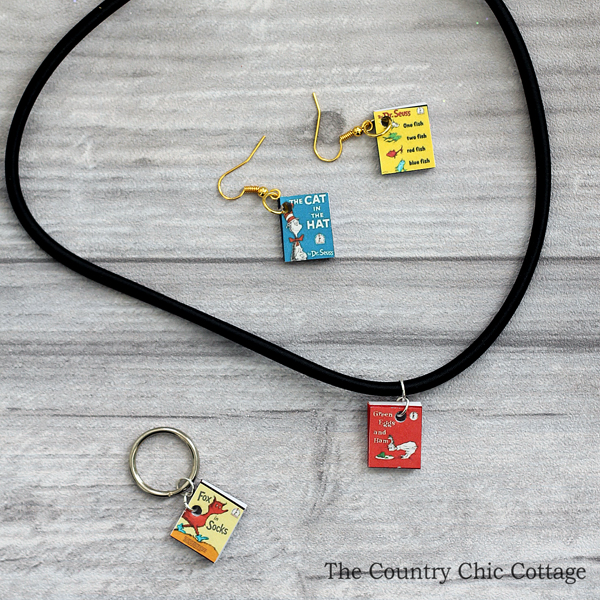 You can make Dr. Seuss jewelry for a teacher or to celebrate Read Across America Day! This mini Seuss book jewelry is easy to make and perfect for both!