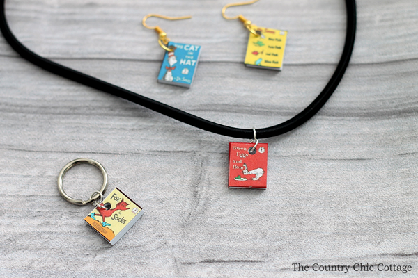 You can make Dr. Seuss jewelry for a teacher or to celebrate Read Across America Day! This mini Seuss book jewelry is easy to make and perfect for both!