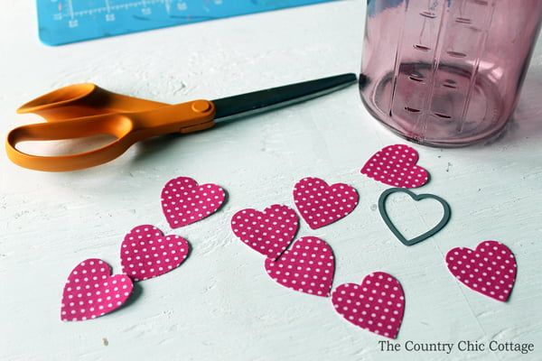 Make this Valentine's mason jar for your Valentine's Day decor! A fun mason jar craft that is perfect as a vase or to give a Valentine's gift. Plus you can make this one in 15 minutes or less!