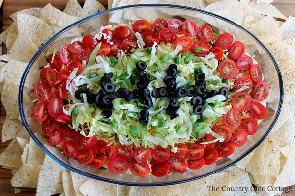 Make this avocado taco dip for the big game or anytime! A delicious dip that is the perfect appetizer at any party!