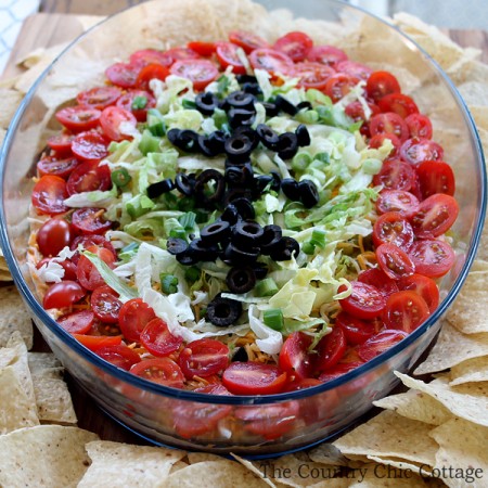 Make this avocado taco dip for the big game or anytime! A delicious dip that is the perfect appetizer at any party!