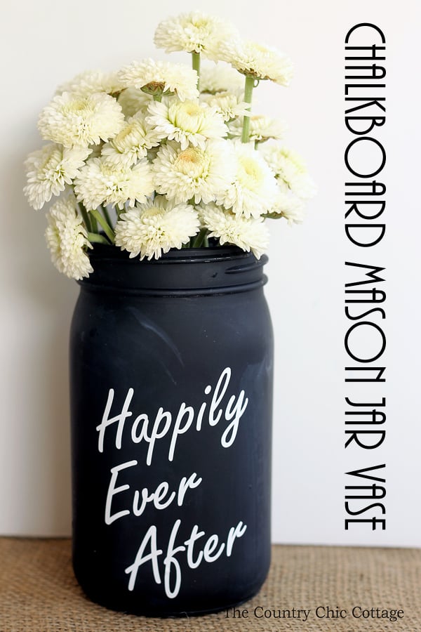 Make this chalkboard mason jar vase in just minutes for your wedding! A fun way to add centerpieces to the tables!