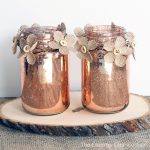 This copper mason jar centerpiece is perfect for weddings and other events! You can make this in minutes and the burlap flowers really add a rustic touch!