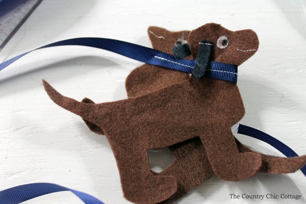 adding ribbon to felt doggy