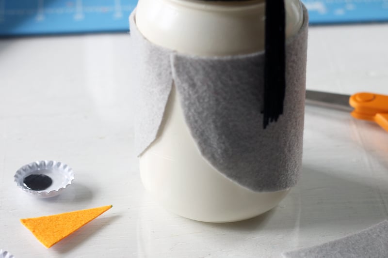 Use your Cricut to cut pieces of felt to create an owl on the mason jar