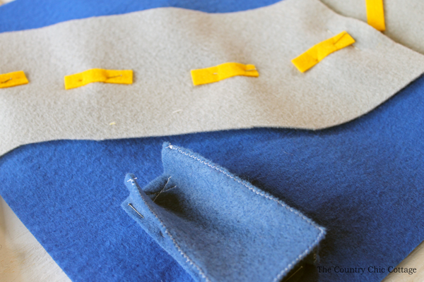 pinning felt items for a busy book page