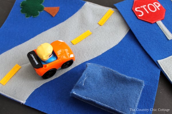 toy car on felt busy book page
