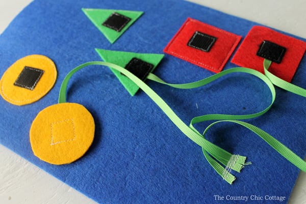 sew shapes to felt busy book page