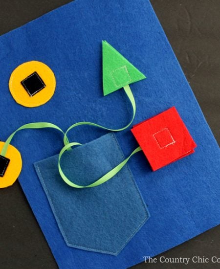 Make your own shapes busy book page! A busy book is a great handmade gift for babies and toddlers!