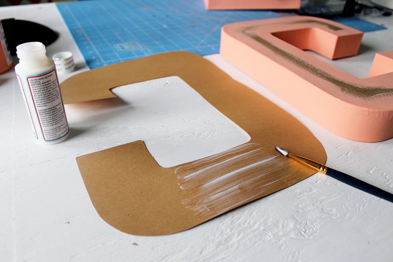 Make some metallic paper crafts with these DIY metallic letters. Yes you can buy paper that has a metallic sheen and cover monogram letters for your home!