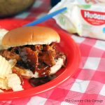 Make this slow cooker BBQ chicken recipe in your crock pot anytime of the year! A tangy barbecue recipe that the whole family will love!