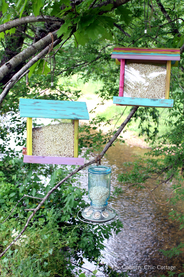 beach house-themed painted bird feeders
