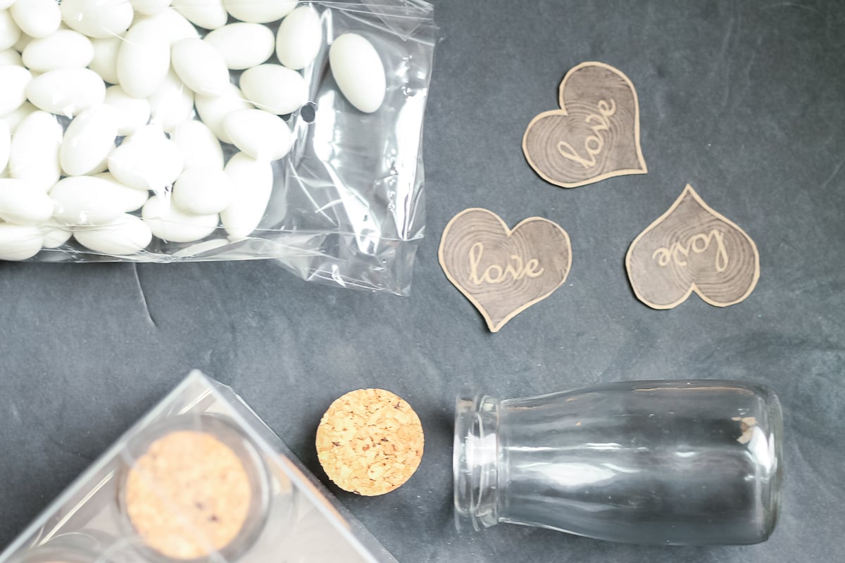 assembling wedding favors with candy