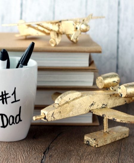 These gold leaf planes with make a perfect Father's Day gift idea! Great for dad's desk at work! See how to make your own here!