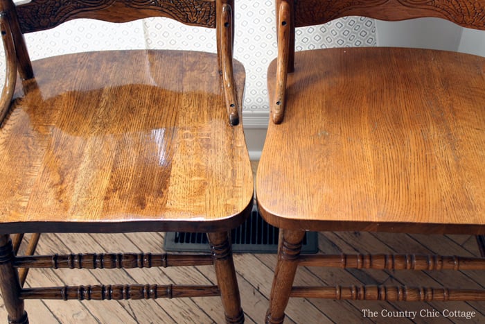 refinished wood chair next to old wood chair