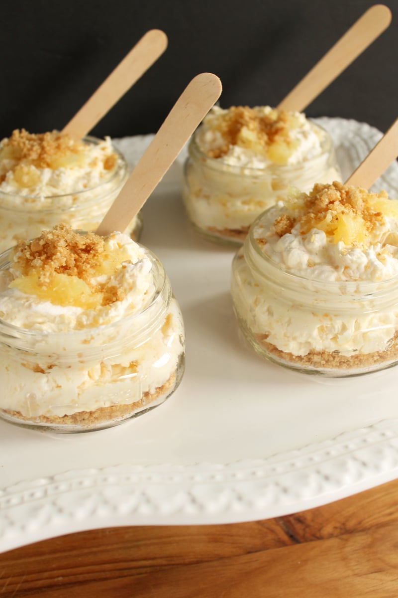 Close view of pineapple cheesecake in jars