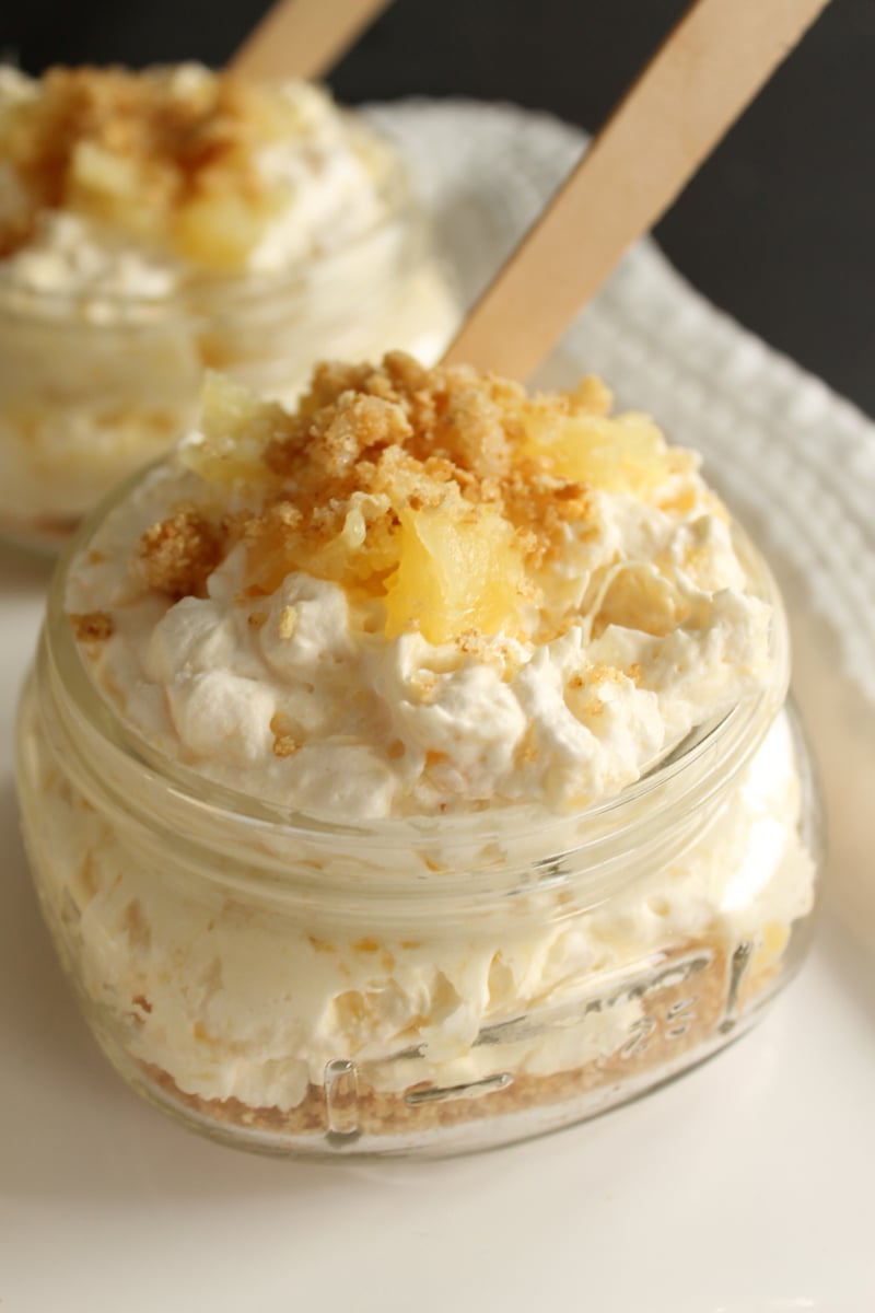 Close view of pineapple cheesecake in jar
