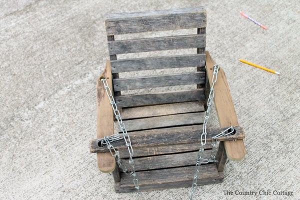 Details on this wood baby swing refinish! You can revitalize an old wooden swing like this as well!