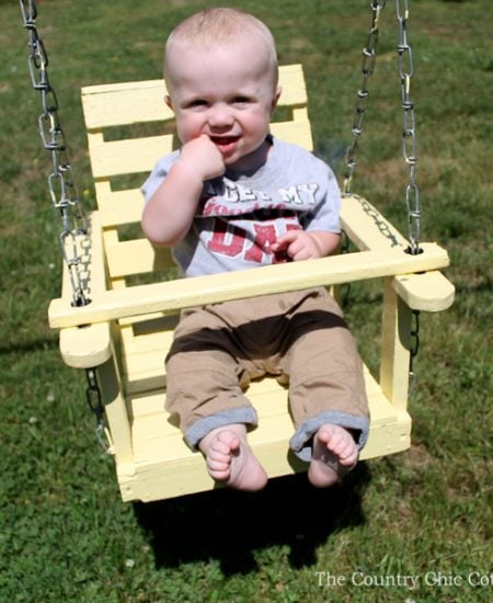 Details on this wood baby swing refinish! You can revitalize an old wooden swing like this as well!