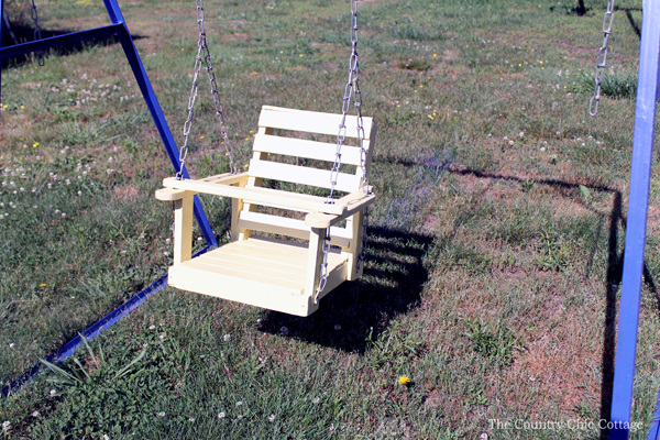 Details on this wood baby swing refinish! You can revitalize an old wooden swing like this as well!