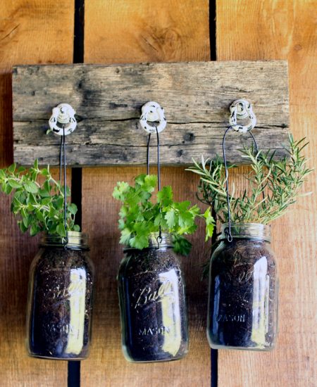 Add this mason jar herb garden to your outdoor decor this summer! You can also bring it indoors all year!