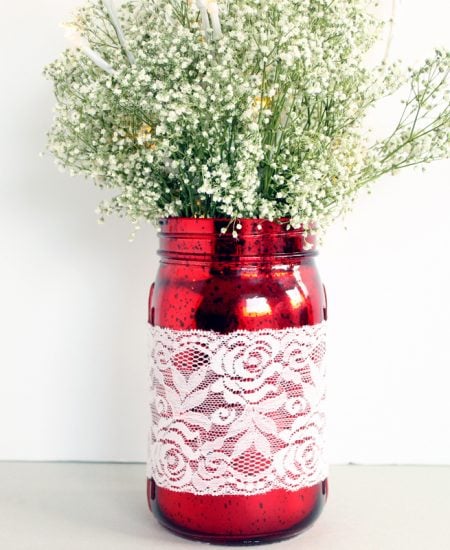 Make this mason jar wedding centerpiece for your reception! It is gorgeous and it lights up!