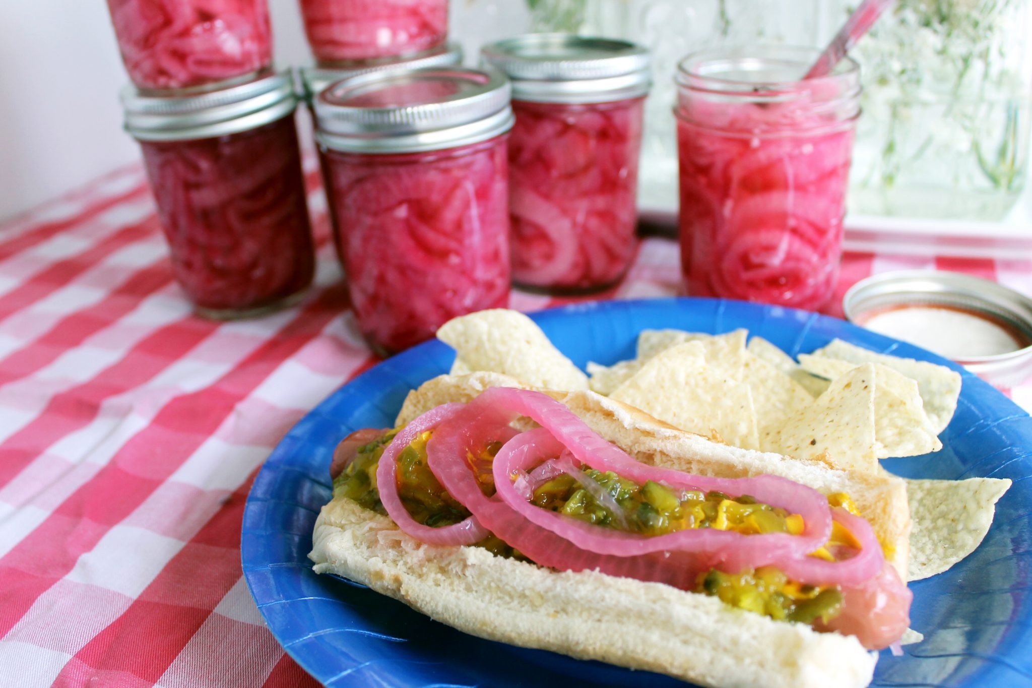 Make this tomato salad recipe with pickled red onions! A great summer salad that everyone will love!