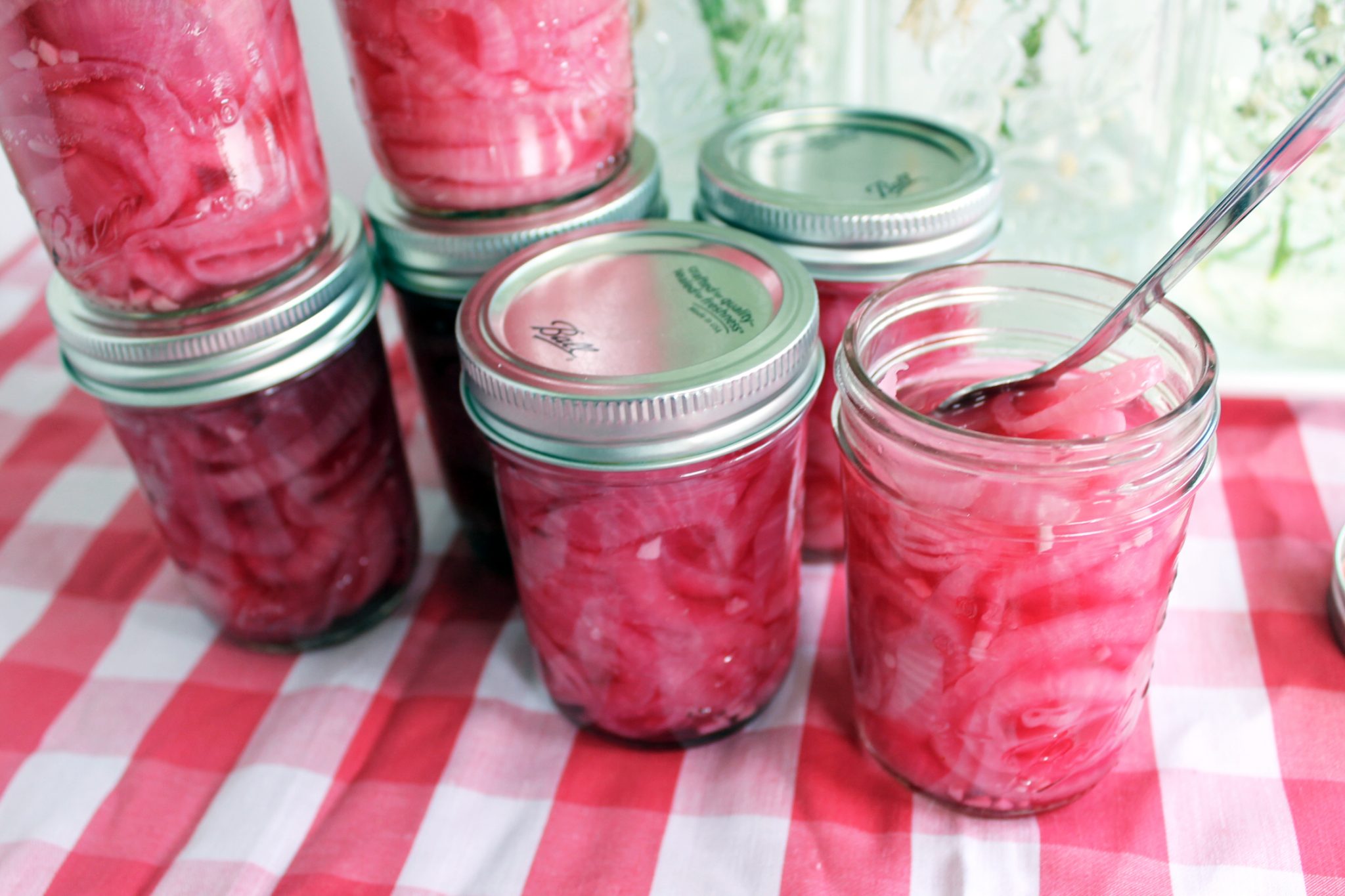 Make this tomato salad recipe with pickled red onions! A great summer salad that everyone will love!