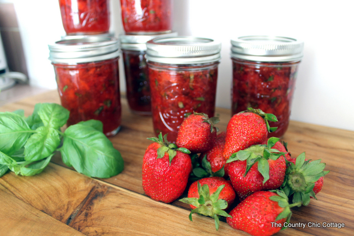 Make strawberry basil jam and add on our free printable labels! A great freezer jam recipe that only takes minutes to make! The sweet and savory combination will really hit the spot!